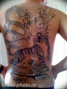 фото тату тигр и дракон 07.12.2018 №034 - tattoo tiger and dragon - tattoo-photo.ru